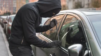 close-up-man-trying-break-into-car
