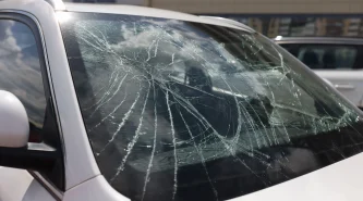 closeup-cracks-broken-car-windshield-car-insurance-concept