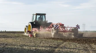 tractor-plowing-land-field