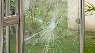 vandalism-concept-damaged-glass-bus-stop-shelter-social-problems